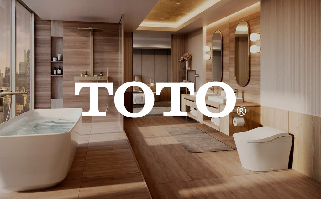 Logo TOTO bằng chữ trắng chồng lên một không gian nội thất phòng tắm.